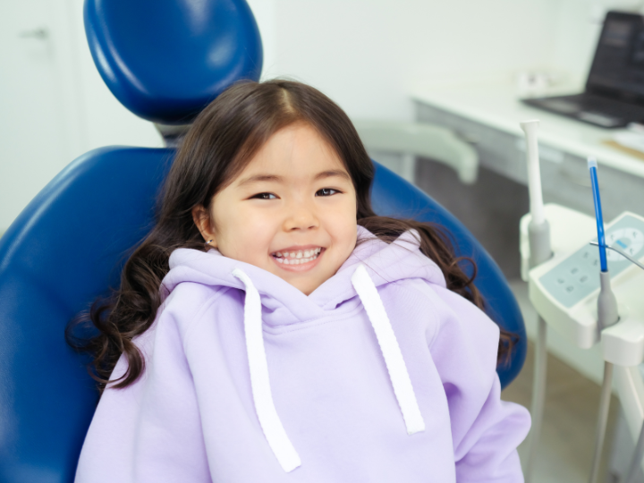 little-girl-on-dentist-chair-with-fillings